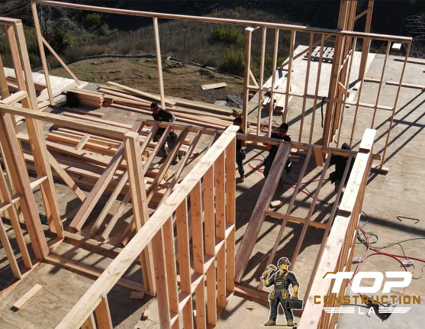 New construction custom home in Los Angeles showing wood framing structure and residential house build in progress